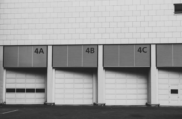Roll-up doors along a warehouse loading dock